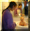 09_1_momo_taking_a_rare_bath.jpg (44363 bytes)